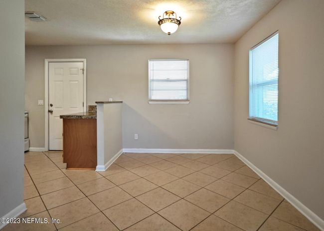 909 13 Th St N, Home with 3 bedrooms, 1 bathrooms and null parking in Jacksonville Beach FL | Image 4