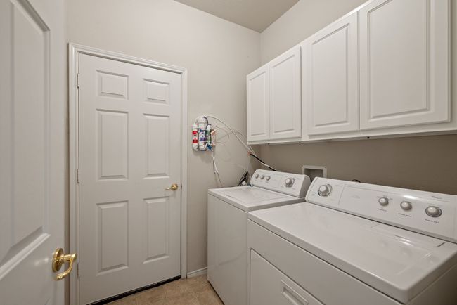 Another view of the secondary bedroom highlighting the hallway access. | Image 31