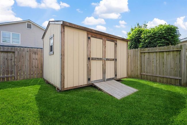 Backyard shed offers great storage for tools or hobbies. | Image 24