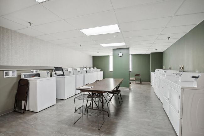Community laundry room. All the washer and dryers are owned by the condo and townhouse association owners. | Image 81