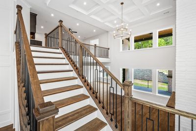 This home offers two staircases. One off of the Foyer and the second, off of the Kitchen. | Image 2