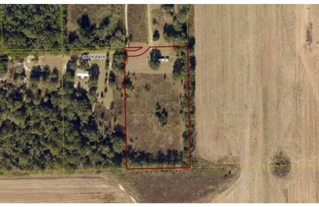 10130 208 Th Path, House other with 2 bedrooms, 1 bathrooms and null parking in O Brien FL | Image 12