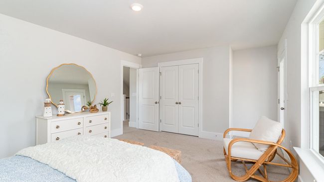 Bedroom featuring light carpet, a closet, and baseboards | Image 27