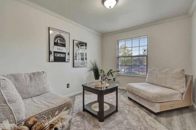 Living area featuring crown molding and hardwood / wood-style floors | Image 7
