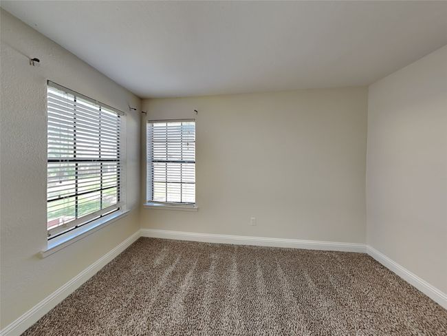 Spare room with baseboards and carpet flooring | Image 19