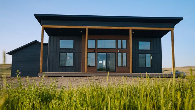 Rear view of house featuring board and batten siding | Image 16