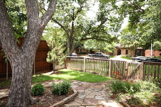 Fenced yard featuring a gate | Image 33