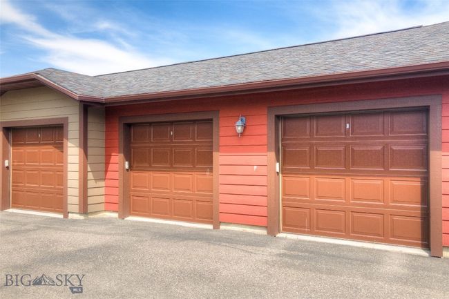 Garage One is Conveniently Located Across From The Condo | Image 34