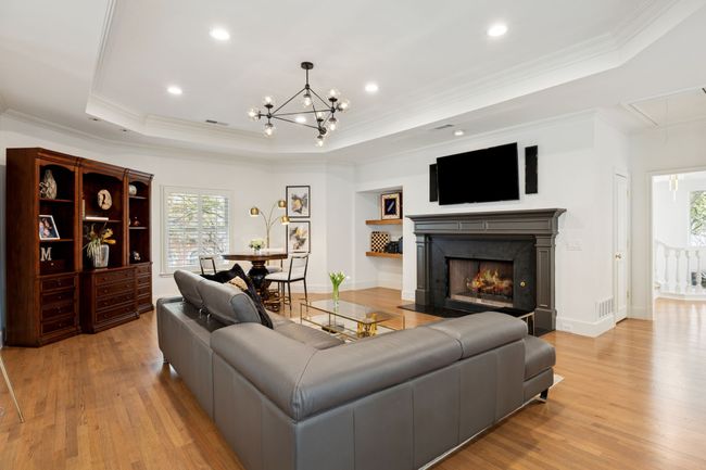 Upstairs game room with gas fireplace | Image 19