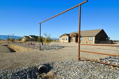 1641 Saddle Ring Court, House other with 5 bedrooms, 4 bathrooms and null parking in Loma CO | Image 1