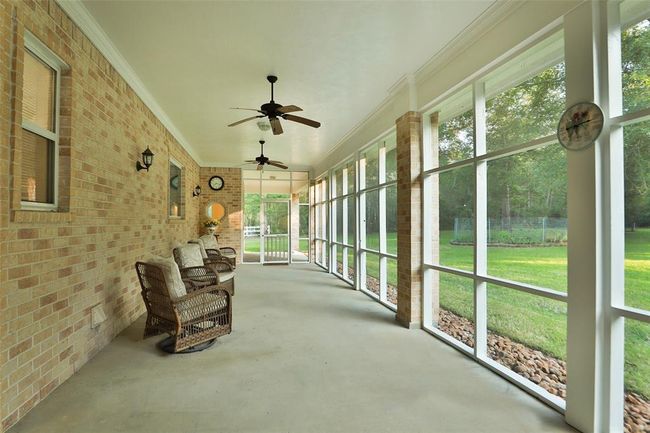 Absolutely spectacular screened back porch-faces SW, mosquito free and space for large parties and/or lots of plants. | Image 37