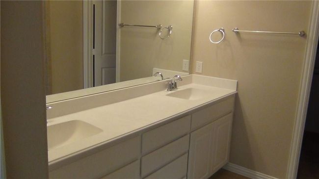 Bathroom featuring double vanity | Image 10