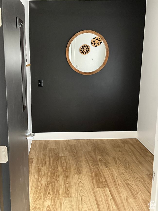 Room details featuring wood finished floors | Image 14