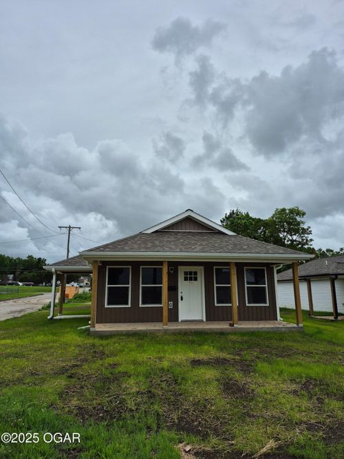 118 W Wilson St, Carterville, MO, 64835-1244 | Card Image
