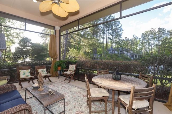 Look at the spacious covered lanai and start planning your meals to enjoy while watching the bird life outside. | Image 52
