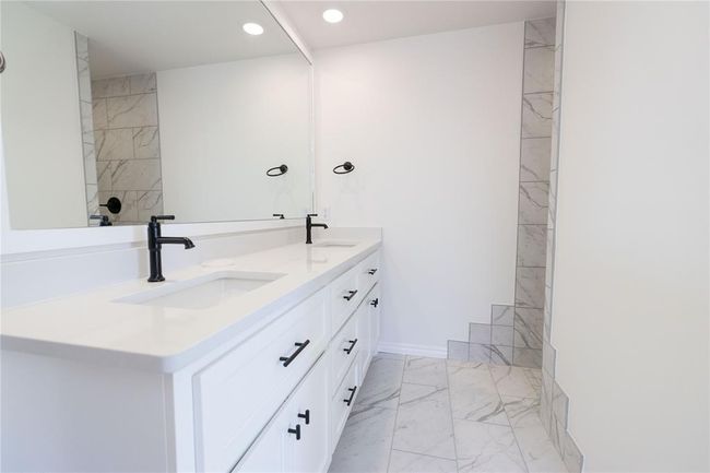 Unfurnished bedroom with a closet, baseboards, visible vents, ceiling fan, and carpet floors | Image 13