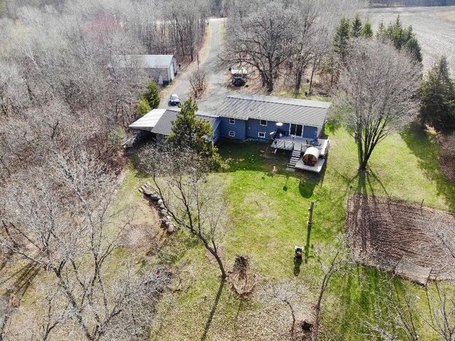 Mature trees surround the property | Image 50