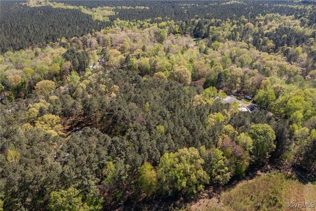 Birds eye view of property with a wooded view | Image 37