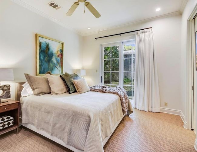 Large bedroom with French doors to the outdoors | Image 21