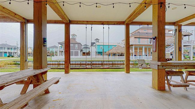 Plenty of space for outdoor entertaining, complete with swings where you can relax and enjoy the soothing sounds of the surf. | Image 4
