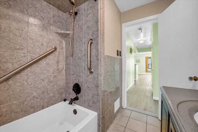 Beautiful ceramic tile shower | Image 17