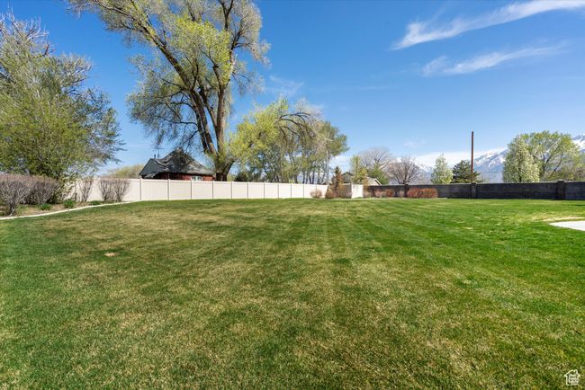 View of yard featuring fence | Image 48