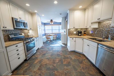 Kitchen w/Tiled Floor & Back Splash | Image 2