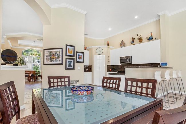 3848 Oak Ridge Cir, House other with 4 bedrooms, 3 bathrooms and null parking in Weston FL | Image 25
