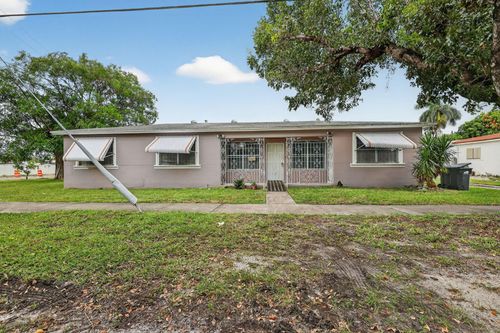 596 Ragan Dr, Miami Springs, FL, 33166-7309 | Card Image