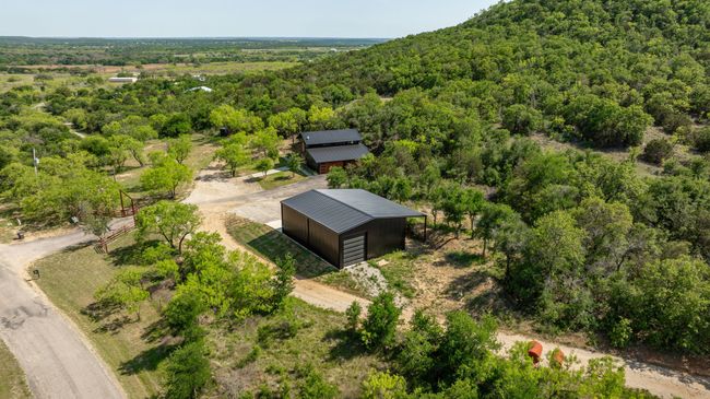 Birds eye view of property with a wooded view | Image 28
