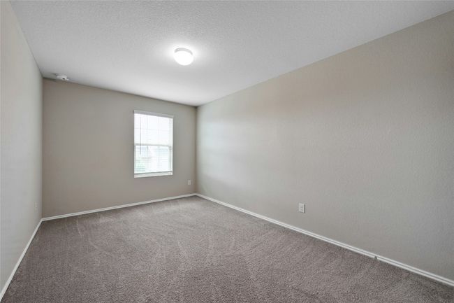 Room with carpet flooring and a textured ceiling | Image 10