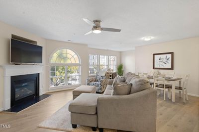 03 Living room with gas log fireplace | Image 3