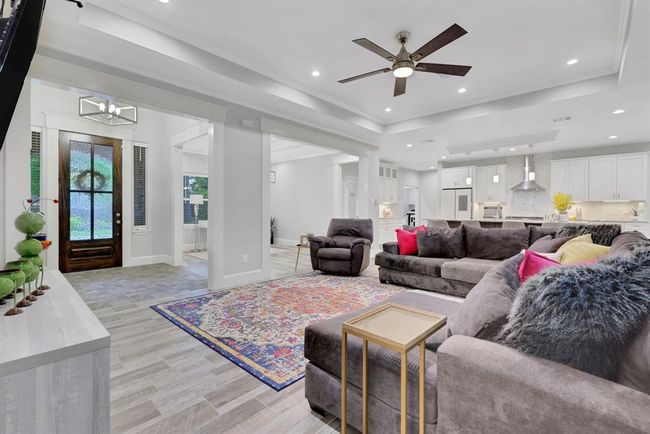 Living area exudes grace and charm with magnificent windows as its centerpiece | Image 15
