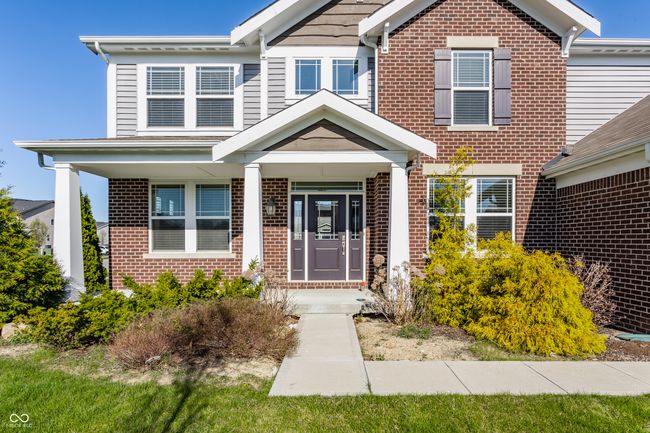 view of front of property with brick siding and a porch | Image 4