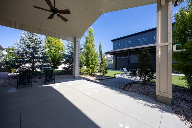 View of patio / terrace featuring ceiling fan and a garage | Image 83
