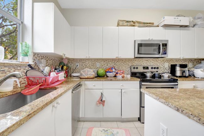 1910 Shoma Dr, Condo with 3 bedrooms, 4 bathrooms and null parking in Royal Palm Beach FL | Image 21