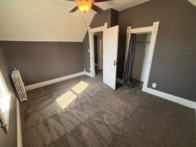 Upstairs bedroom 2 with closet | Image 19
