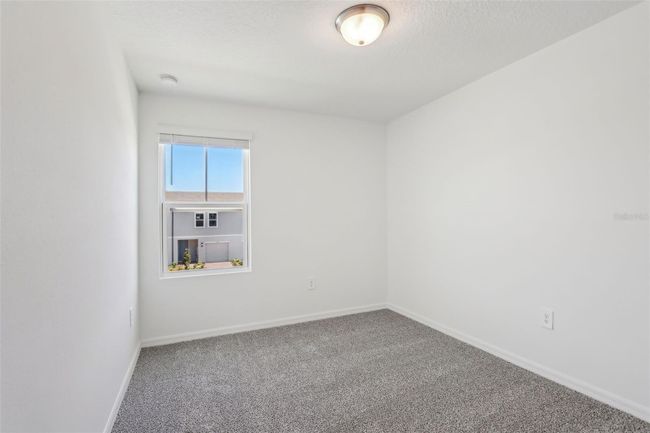 16419 Bird Of Paradise Ave, Townhouse with 3 bedrooms, 3 bathrooms and null parking in CLERMONT FL | Image 22