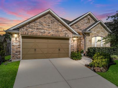 Welcome home to 201 Trillium Park Loop located in the master planned community of Grand Central Park and zoned to Conroe ISD. | Image 1