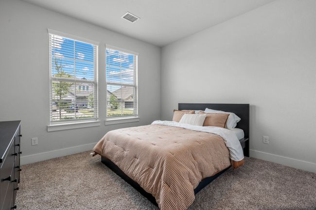 Carpeted bedroom featuring baseboards | Image 20