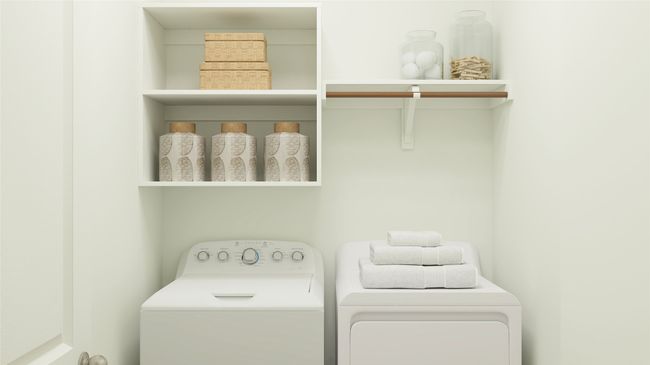 Clothes washing area with washer and clothes dryer | Image 5