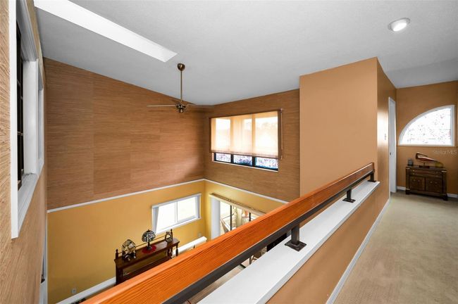 Primary Bedroom Loft Walk to Third Floor East Facing open air balcony. An option to enclose for another space for an office, hobby room or zen room. If one needed a third bedroom, there is room to construct over the living room. | Image 48