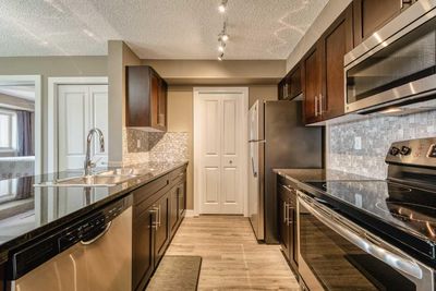 8405 - 403 Mackenzie Way Sw, Condo with 3 bedrooms, 2 bathrooms and 1 parking in Airdrie AB | Image 3