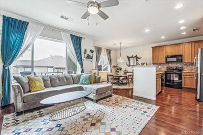 Beautiful living room in this open floor plan | Image 3