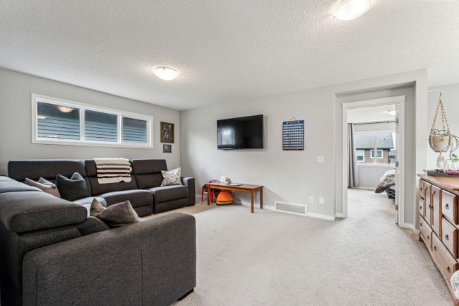 74 Buckskin Way, Home with 4 bedrooms, 3 bathrooms and 4 parking in Cochrane AB | Image 7