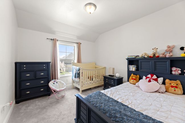 Bedroom with carpet floors | Image 32