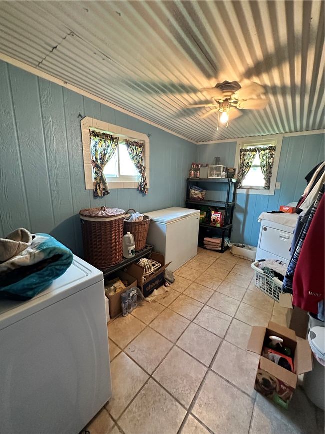 Laundry area featuring separate washer and dryer | Image 18