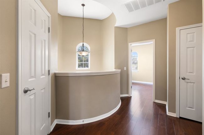 Corridor featuring dark wood-type flooring and baseboards | Image 26
