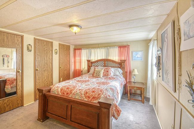 Bedroom with light colored carpet | Image 5
