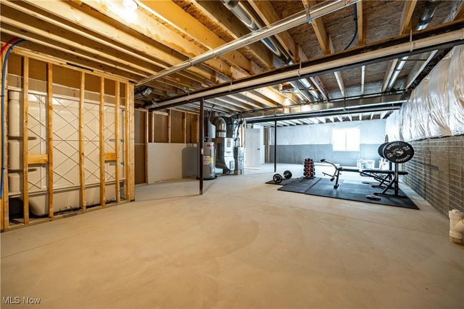 Basement featuring water heater | Image 32